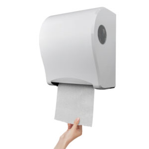 White plastic automatic hand towel dispenser mounted on the wall with a curved body design A round transparent window on the right side indicates the paper level