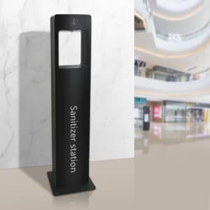 Black floor-standing sensor sanitizer station installed in a commercial mall environment spray/foam/liquid modes, 3 adjustable dosage levels, dual 5L capacity