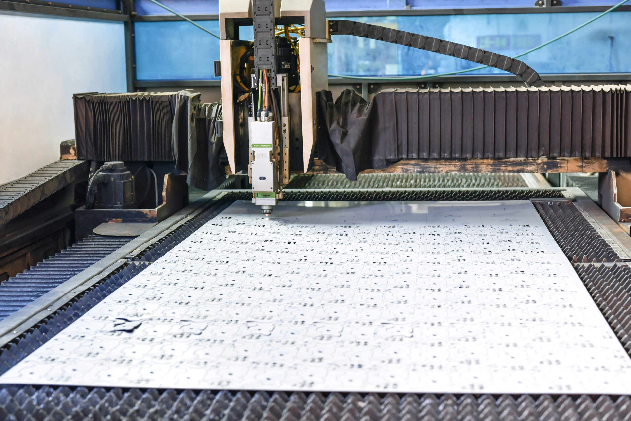 AOLQ has High precision laser cutting machine processing stainless steel sheet for customized public hygiene products.